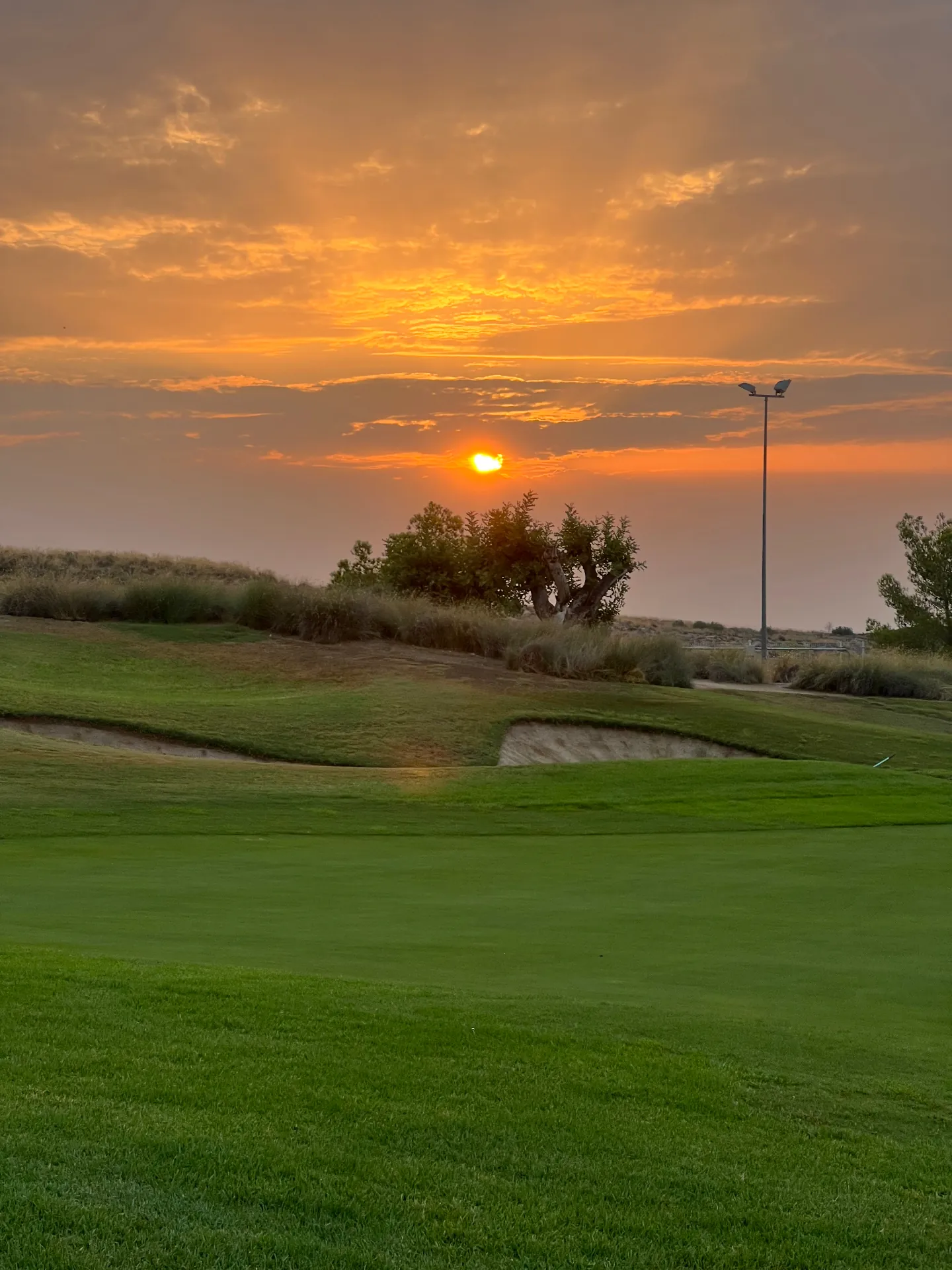 Sunset over the fairway at La Torre Golf Resort